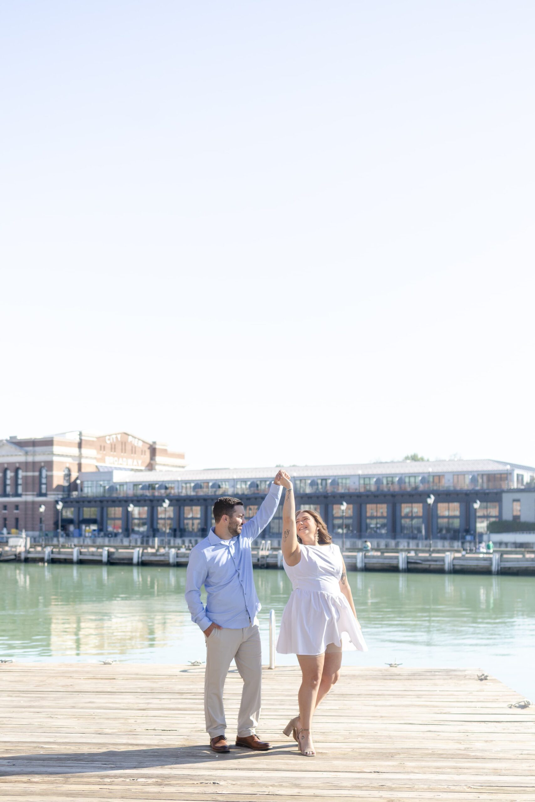 Couple dancing on a pier in Fells Point, Maryland